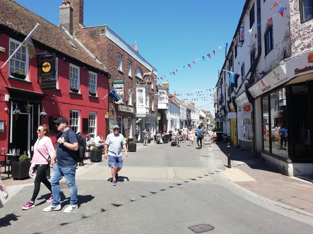 The old highstreet in Poole, Dorset. Pedestrians make use of the full width of the street as car access has been removed..
