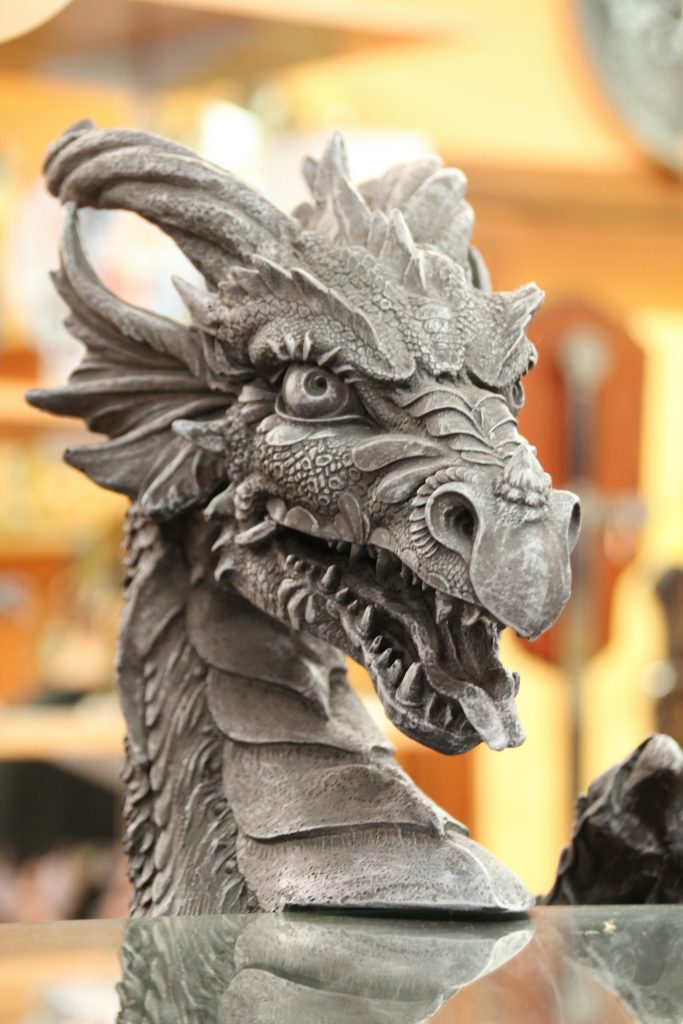 A stone dragon head sculpture.