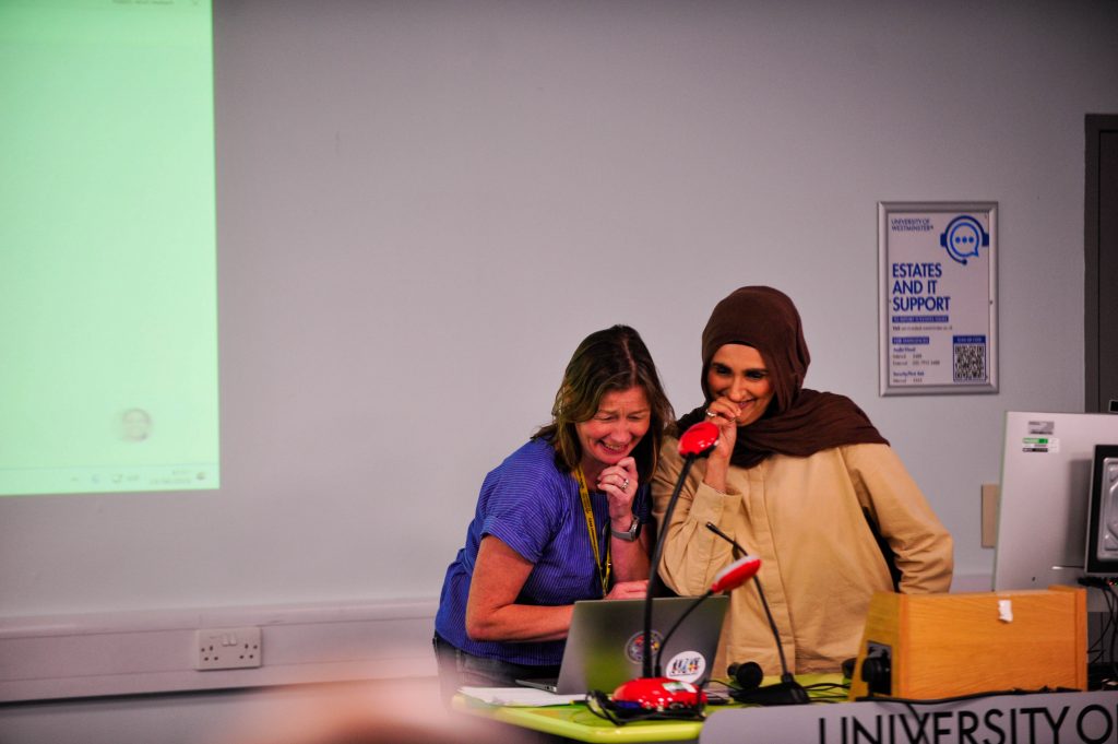 Two presenters were preparing the PowerPoint presentation.