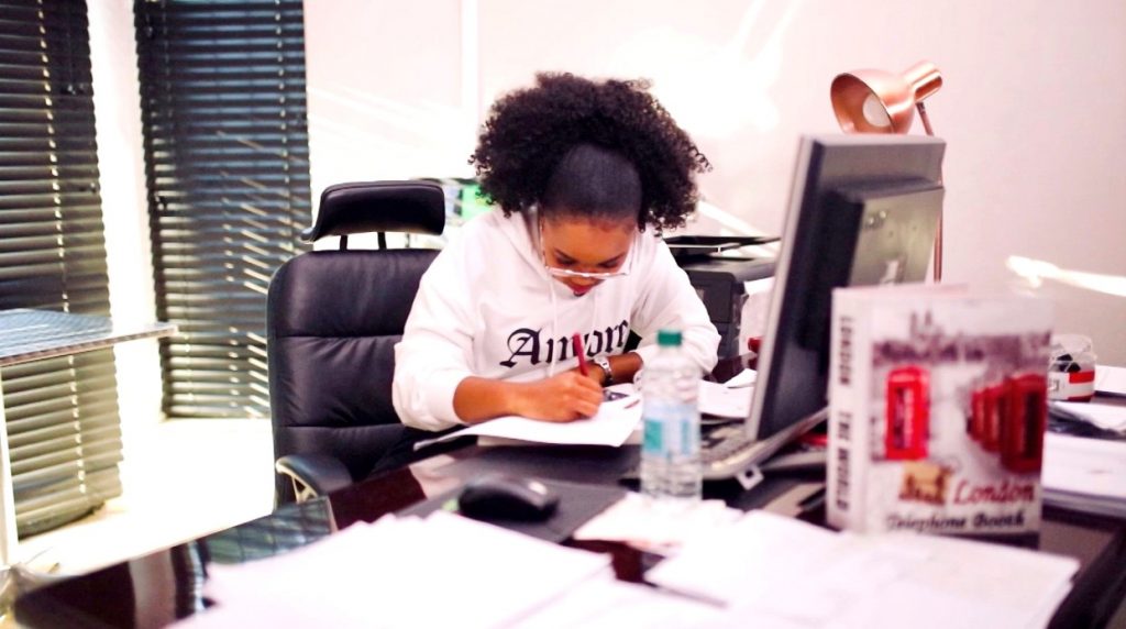 Creating a Social Enterprise: An Interview with Nomhle Shantel Shenxane_International Student Blog_Shantel working in her office