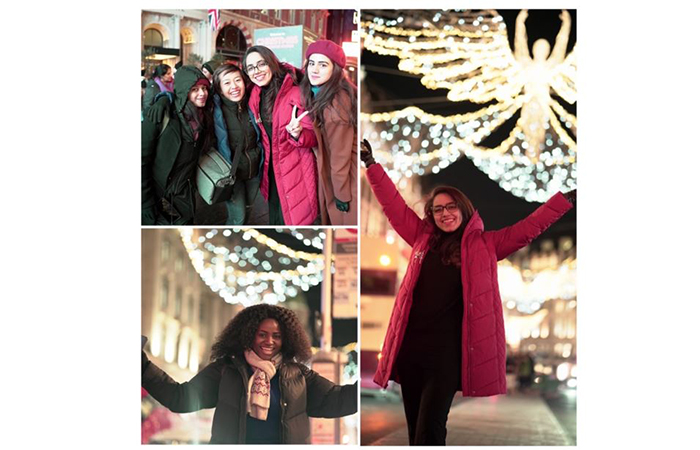 Thao with classmates enjoying Christmas lights_700