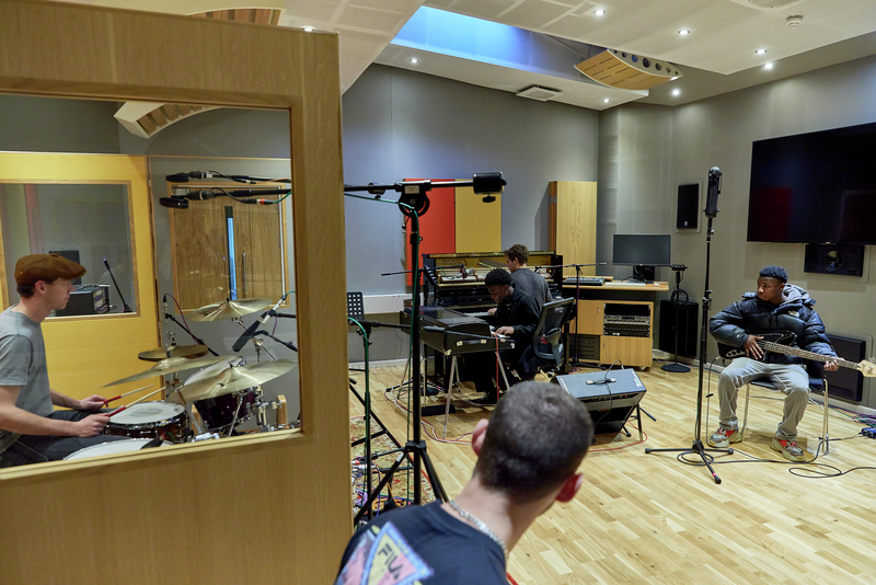 music students recording in the studio