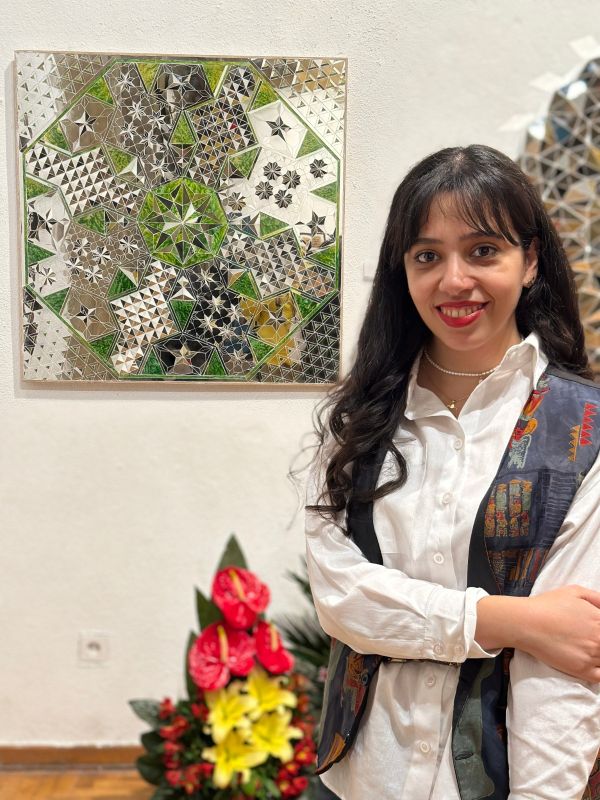 Yasi with artwork-Ideate-Big Idea Competition