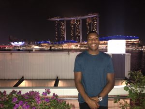 Photo of Michael in front of the Marina Bay Sands in Singapore