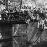 A group of Ramblers on a bridge over a canal