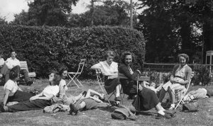 Photo of female ramblers relaxing in a garden