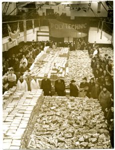 Photo show the Gymnasium full of food supplies