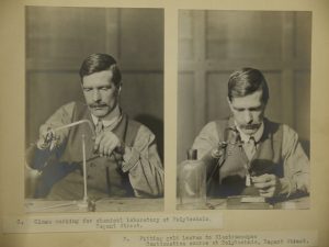 Black and white photograph of man with arm amputation working with glass