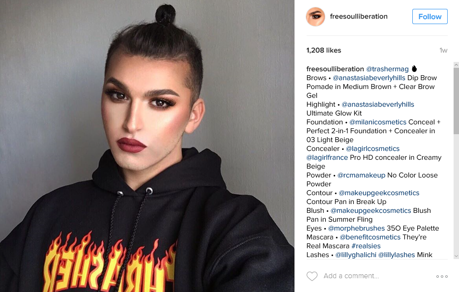 Endrin wearing a smokey eye and red lip. Credit @freesoulliberation on Instagram