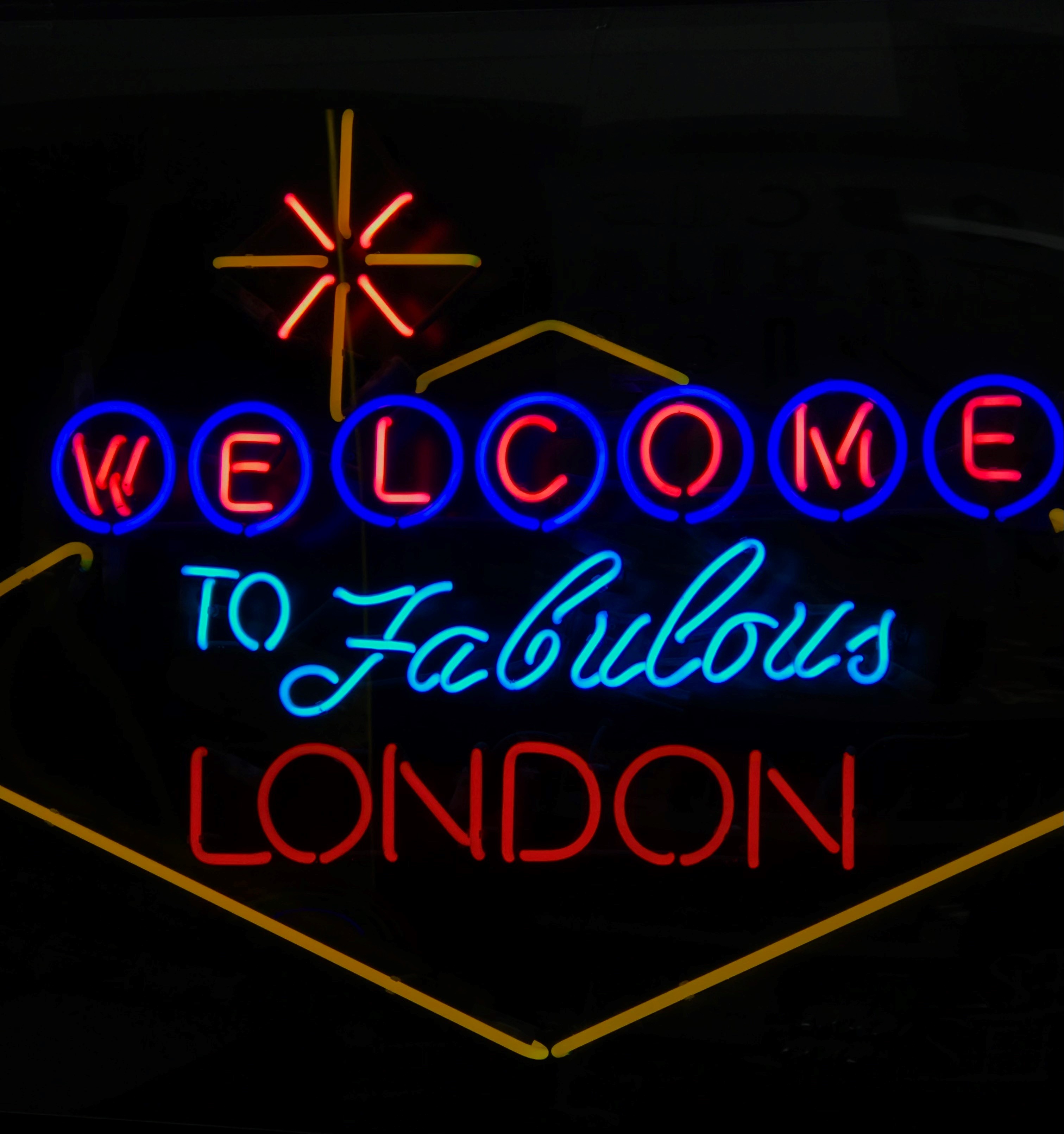 "Welcome to Fabulous London" neon sign writing