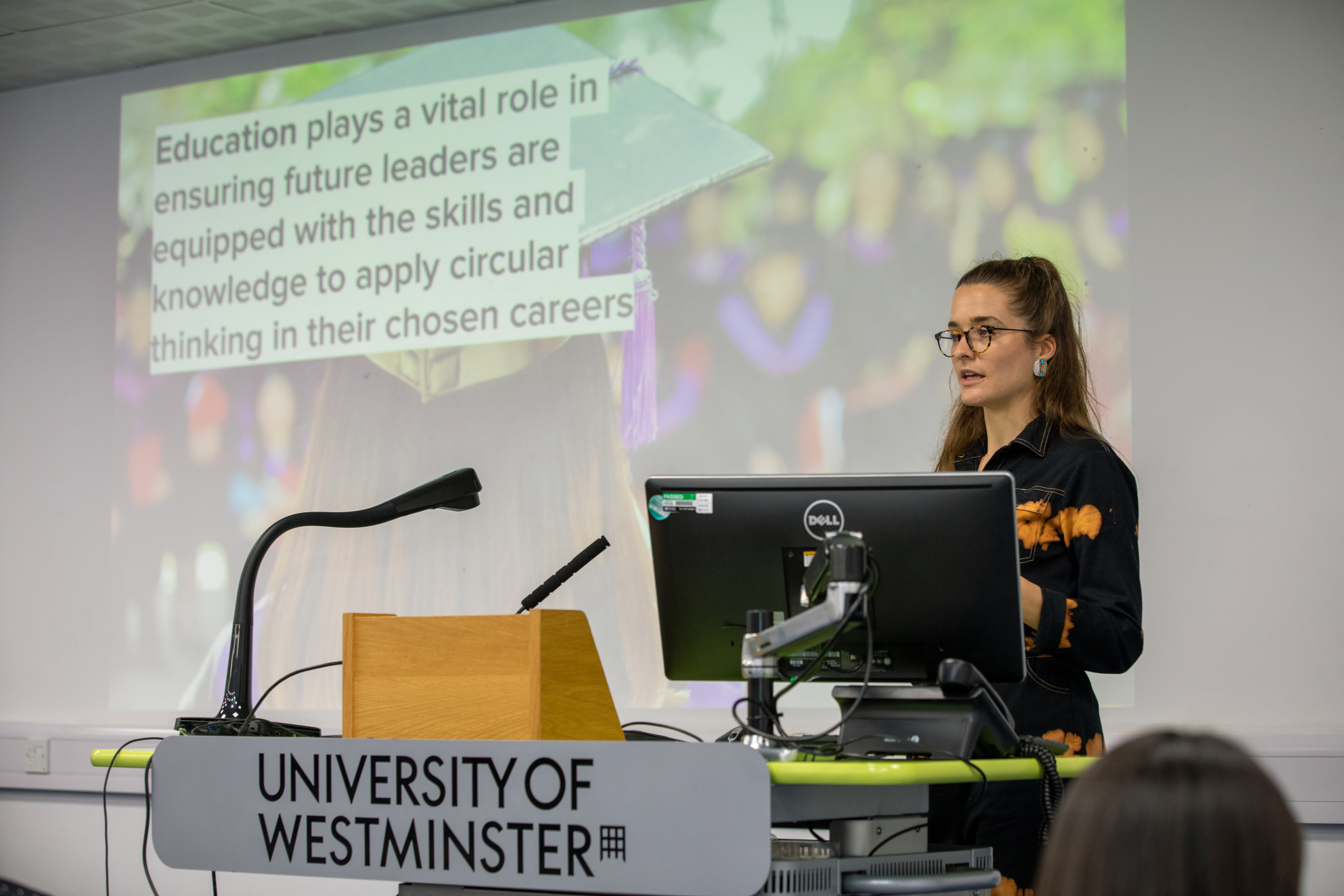 Nikki Kapp, Ellen MacArthur Foundation, speaking at the podium