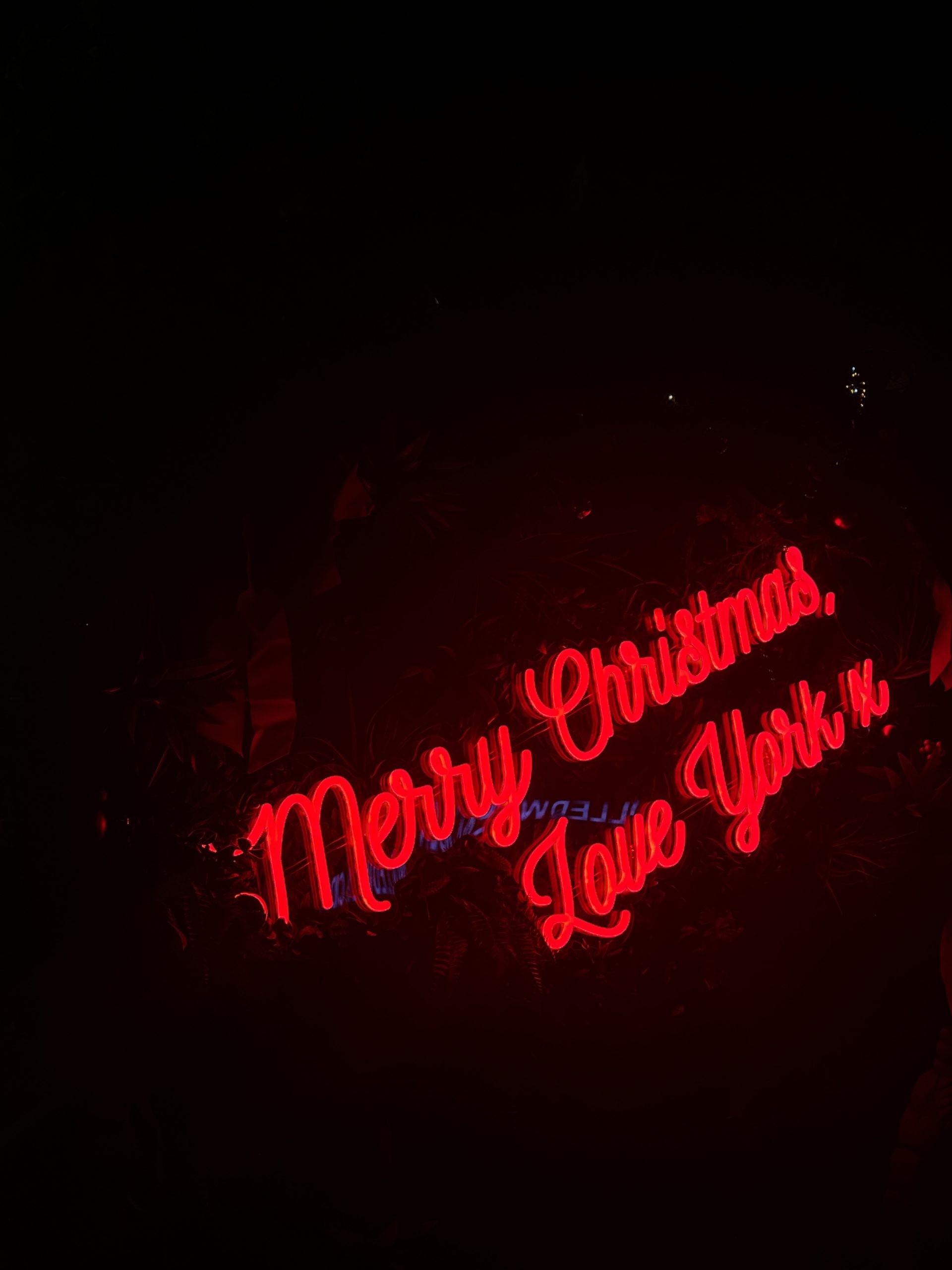 Christmas Lights, York, England. Neon sign in red with the text reading:
"Merry Christmas,
Love York x"