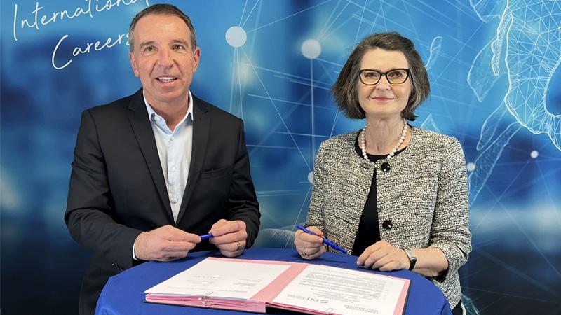 Dr Christophe Boisseau and Dr Katalin Illes signing progression agreement