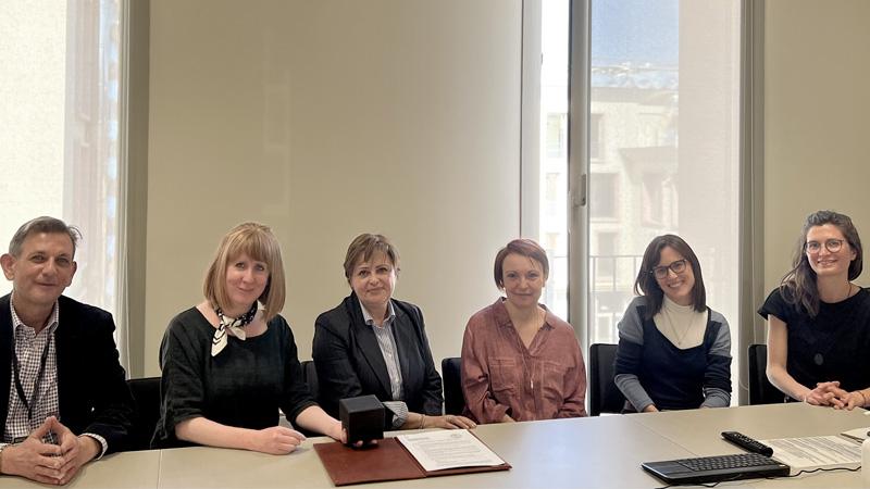 University of Turin MoU signing - Dr Karen Jackson presenting Professor Luisa Tibiletti with a gift following the signing of the MoU