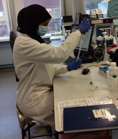 Fourth year Biomedical Sciences student Sumaya working in a lab