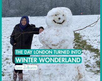 The Day London Turned into Winter Wonderland_International Student Blogger_Lynn Zulkarim_Lynn leaning against a snowman