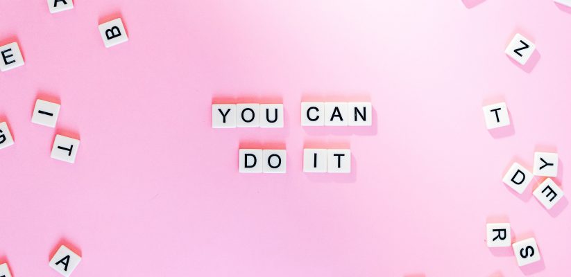 Text on a pink background which reads "You Can Do It"